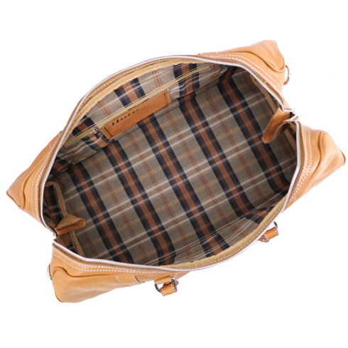 The Floto Parma Duffle Bag is a leather weekender that is handcrafted in Italy with our famous Parma leather. Parma leather is tanned in a special way with no chemicals so the bag will get better as it ages - each travel bag takes on a unique look and darkens like a saddle over time. Parma is leather tanning the natural way. 8